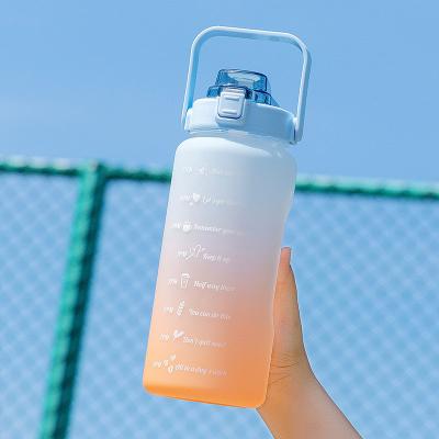 China Logotipo personalizado aceptable botella de agua de 64 oz paja extraíble para el fitness y los deportes en venta