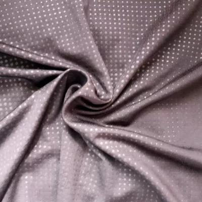 China Breathable Milk Silk Nylon Fabric with Embossed Press Various Patterns and Trademarks for sale