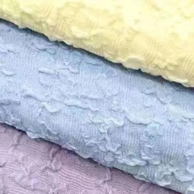 China Breathable Popular bubble polyester spandex knitted clothing jacquard fabric for sale