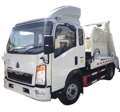 China Building Material Shops Good Price China Sinotruk HOWO 4x2 4cbm 5cbm 6cbm 7cbm 8cbm Swing Arm Garbage Truck For Sale for sale