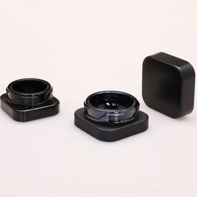 China Child safe packaging 5ml 9ml 5g 9g square glass child eye jar black cosmetic cream resistant black glass jar for sale