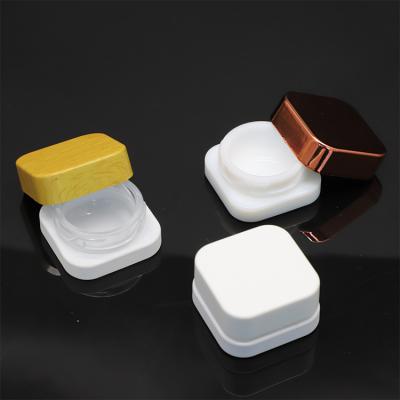 China 5ml 9ml square small child cosmetic cream white glass cosmetic container heavy duty square jar for sale