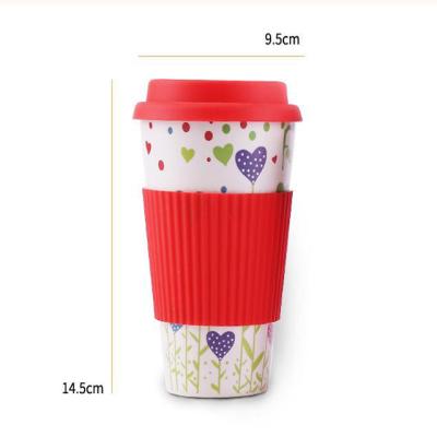 China Sustainable Biodegradable Bamboo Fiber Coffee Mug Hot Sale Mug With Silicone Lid And Sleeve for sale