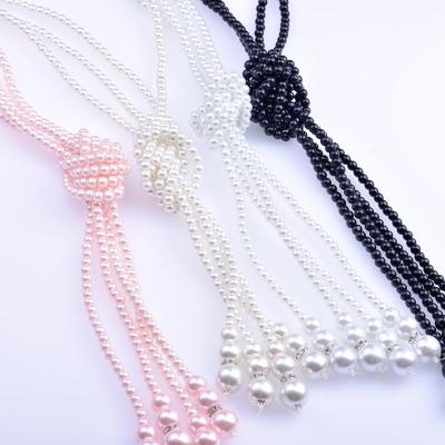 China Vintage New Fashion Long Glass Pearl Sweater Chain For Women Double Layer Necklace For Sale for sale