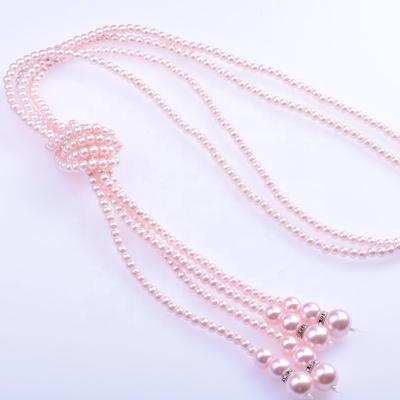 China Fashionable Long Necklace Women Vintage Sweater Pearl Sweater Chain Glass Necklace for sale