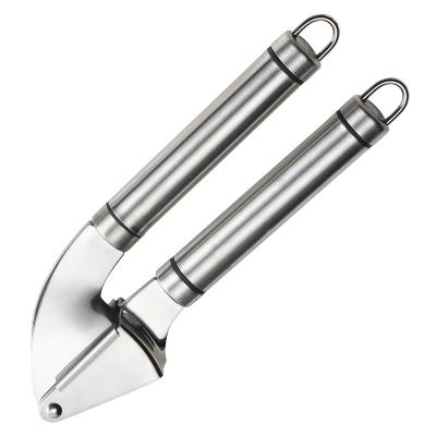 China Viable Factory Direct Creative Kitchen Tools Ginger And Garlic Crusher Stainless Steel Garlic Press for sale