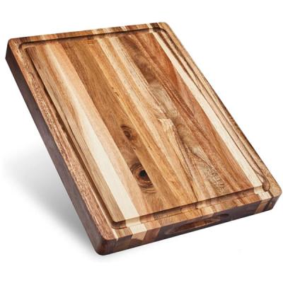 China Sustainable Hot Sale Acacia Amazon Wood Cutting Board Kitchen Serving Cutting Butcher Block With Deep Juice Grooves for sale