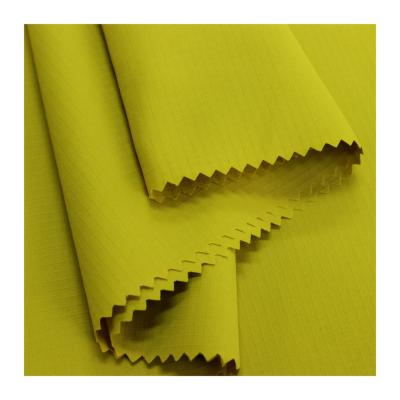 China Waterproof polyester woven bio-comparative nature yellow coat fabric for sale