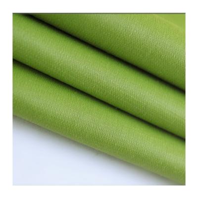 China Tear-resistant nylon spandex woven emerald green cotton fabric for sale