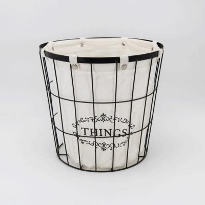 China Sustainable Round Laundry Metal Wire Storage Basket With A Cloth Bag for sale