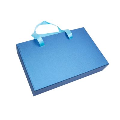 China Recyclable Custom Labeled Corrugated Box Clothing Kraft Paper Box With Handle for sale