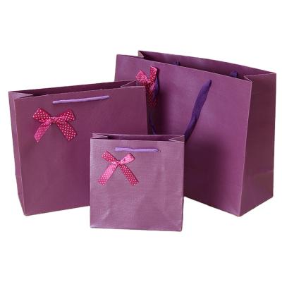 China Recyclable Exclusive Paper Bag PP Rope Handles Shopping Paper Packaging Bag for sale