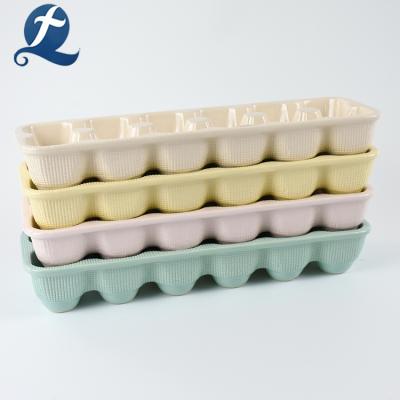 China Sustainable Wholesale Colorful Custom Ceramic Egg Crate for sale