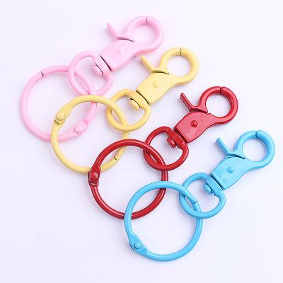 China Fashional Souvenir Gifts Color Paint Key Chain DIY Jewelry Accessories Lobster Buckle Dog Key Chain Accessories Key Chain Custom for sale