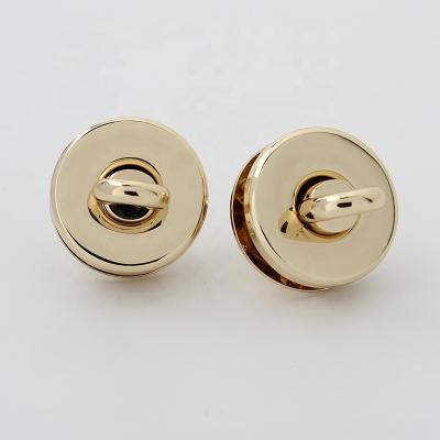 China Nolvo World Light Gold Good Quality Purse Clips Polished Metal Clips With Screw Strap Clips for sale