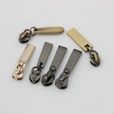 China Polished High Quality Nolvo World 4Colors Zipper Puller Alloy Zipper Slider Jacket Strong Pull for sale