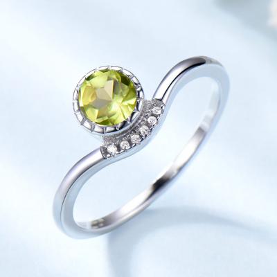 China Fashion Environmental Friendly Wholesale Jewelry Gems Ring Modern Light Green Stone Ring Designs For Ladies for sale