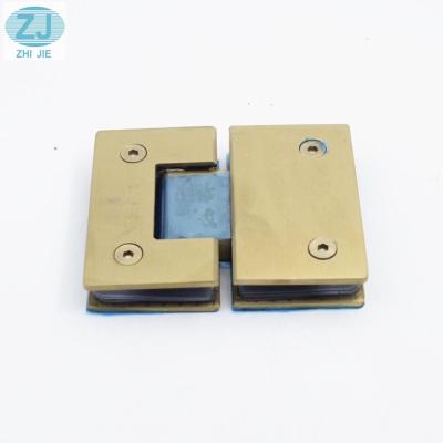 China Modern Gold Flange Pivot Bathroom Stake Clip Screen Hinge Holder Titanium Heavy Duty Shower Glass Door Hinge for sale