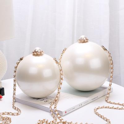 China Beautiful Round Acrylic Beige Clutch Bag Evening Clutch Bags Ladies Clutches and Party Evening Clutch Bags for sale