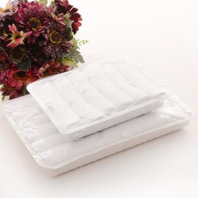 China Disposable Hot Selling 22g 10pcs Per Tray Perfumed Disposable Cotton Airline Hot Towels for sale