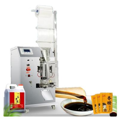 Cina New Design 3 side Seal Small Vertical packaging machine Automatic Pure liquid Juice Sauce Pouch Packing Machine in vendita