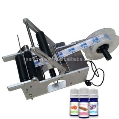 Cina MT50 Semi-auto Round Bottle Labeling Machine Semi-auto Labeler Semi Automatic label machine in vendita