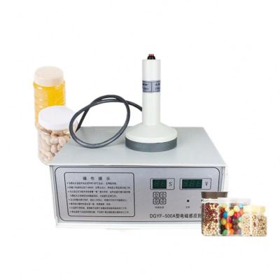 China DGYF-500A Inductiefolie afdichting machine voor cosmetische medische flessen glazen potten Te koop