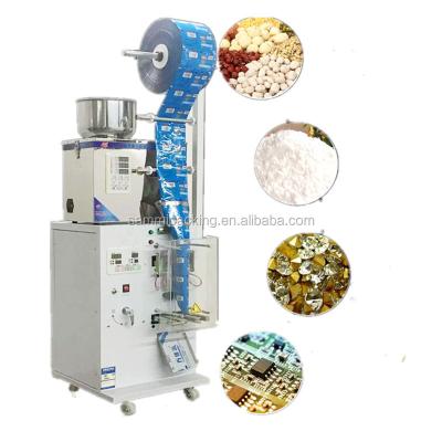 China Nuevo producto SMFZ-70 Máquina automática de llenado de sachet de sal, embalaje y sellado Máquina de madera para especias Polvo/nutas/granos/arroz en venta