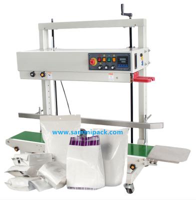 China FRD-1200V Elektrische halfautomatische hitteverzegelmachine voor continue verticale verzegeling van plastic zakken voor drankzakjes Hout Te koop