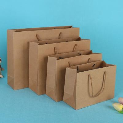 China Reusable China Supplier Custom Logo Brown Kraft Paper Bags With Nylon Handle Rope Custom Logo Paper Bag for sale