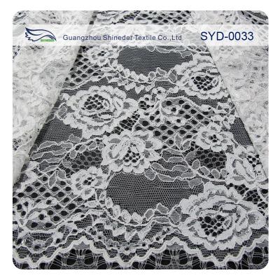 Chine Le tissu de dentelle de fleur de Chantilly attaché par robe noire/a brodé le tissu de dentelle à vendre