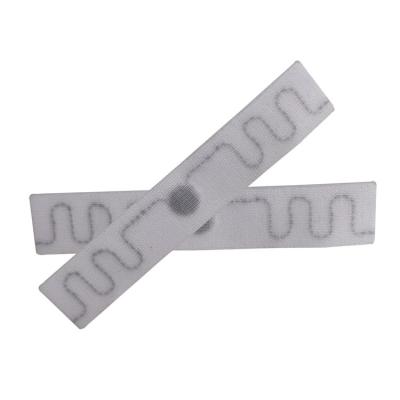 China Waterproof / Impermeable Custom Barcode Printing Clothing Label UHF RFID Smart Apparel RFID Tag for sale