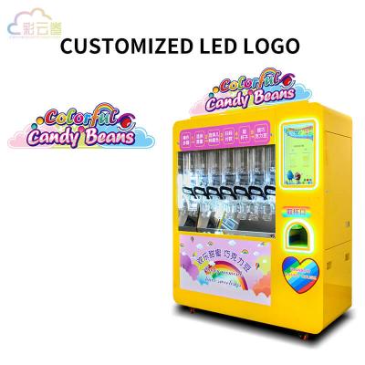 China Color Candy Bean Vending Machine Coin Operated 5.6Kg Capacity for sale