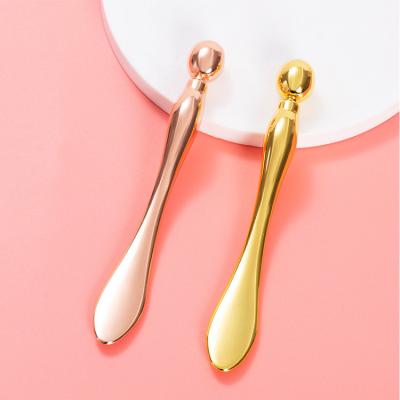 China Eye Care Customize Logo Eye Cream Massage Sticks Wrinkle Remove Eye Massager Tool for sale