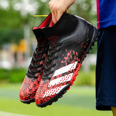 China Cushioning New Kids Soccer Boots Kids Boy Girl Sneakers Cleats Training Outdoor Soccer Shoes for sale