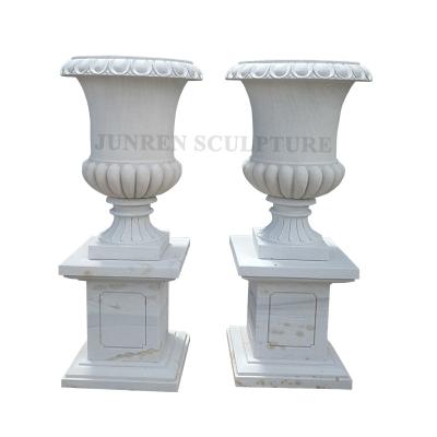 China Simple and classic high quality Europe style flower pot white sandstone planter in stock for garden for sale