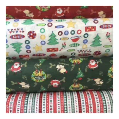 China Christmas Character Cartoon Printing Poplin Fabric Breathable Custom Printed 100% Cotton For Kids Garment for sale