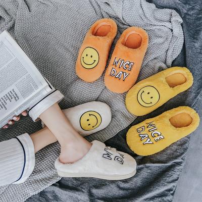 China 2021 Trend Fashion Face Pattern Flat Smile Flat Warm Home Slippers Inside Plush Winter Cute Smiling Fluffy Warm Slippers for sale