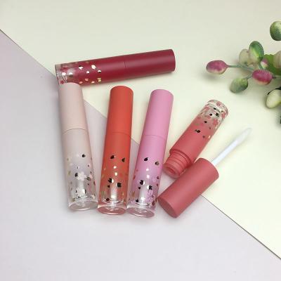 China Small Waterproof Round Empty Lip Gloss Tube 3ml Lip Gloss Tube Pack With Magic Wand for sale