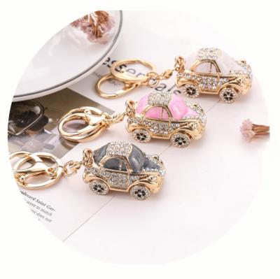 China Lovely Mini Cartoon Metal Popular Creative Crystal Car Beatle Pendant Key Chain For Gift for sale