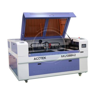 China Laser Engraving Hardware And Nonmetal Metal Sheet Advertising Technology Cutting And Engraving CO2 Laser Machine for sale