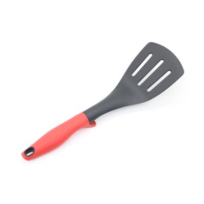 China Sustainable Food Grade Nylon Kitchen Utensils Slotted Shovel With PP + TPR Handle Customized Logo for sale