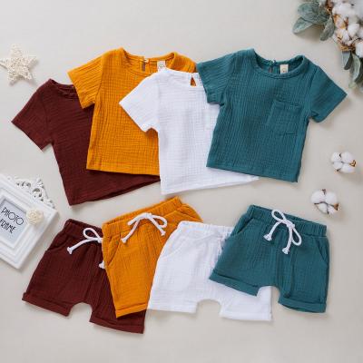 China 6M-5Y Cotton Baby Boy Solid Color Organic Unisex Casual Short Sleeve Tops And Shorts 2pcs Set for sale