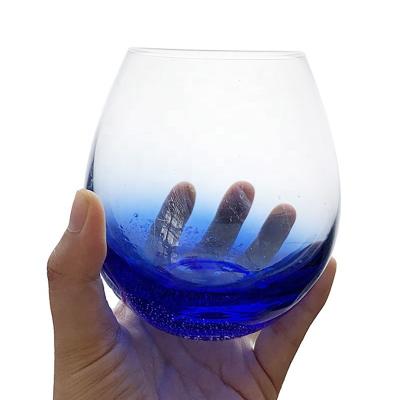 China Creative 18 Ounce Bubble Wine Volume Stemless Glass Handcrafted Tall Glass for sale