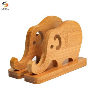 China Universal Wooden Portable Tablet Holder Stand Bamboo Cartoon Elephant Storage Phone Handy Desktop Holder for sale