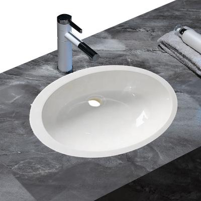 China Modern Hot Selling Hand Made White Resin Oval Shape Small Sink Under Counter Sink for sale