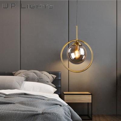 China Creative Round Glass Ball Attic Lamp Vintage Residential Industrial Bronze Iron Nordic Kitchen Hanging Pendant Lights Different for sale