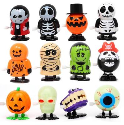 China Small Wind Fun Plastic Ghost Toy Jumping Toy For Halloween Children's Day Gift Horror Pumpkin Halloween Toys for sale