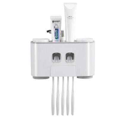 China Sustainable 1 2 3 4 5 Piece Bathroom Set Ecoco Automatic Toothpaste Dispenser White Tooth Paste Dispenser And Brush Holder For Kids for sale