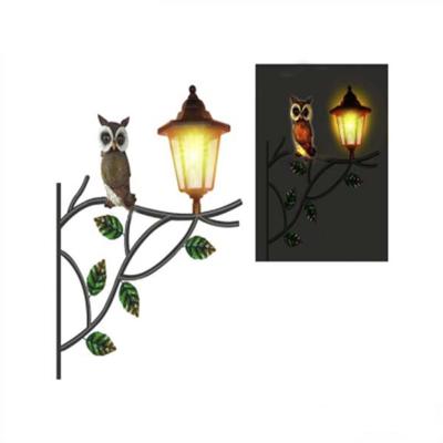 China New Beautiful polyresin light Polyresin+iron+solar iron owl solar light for garden decoration for sale